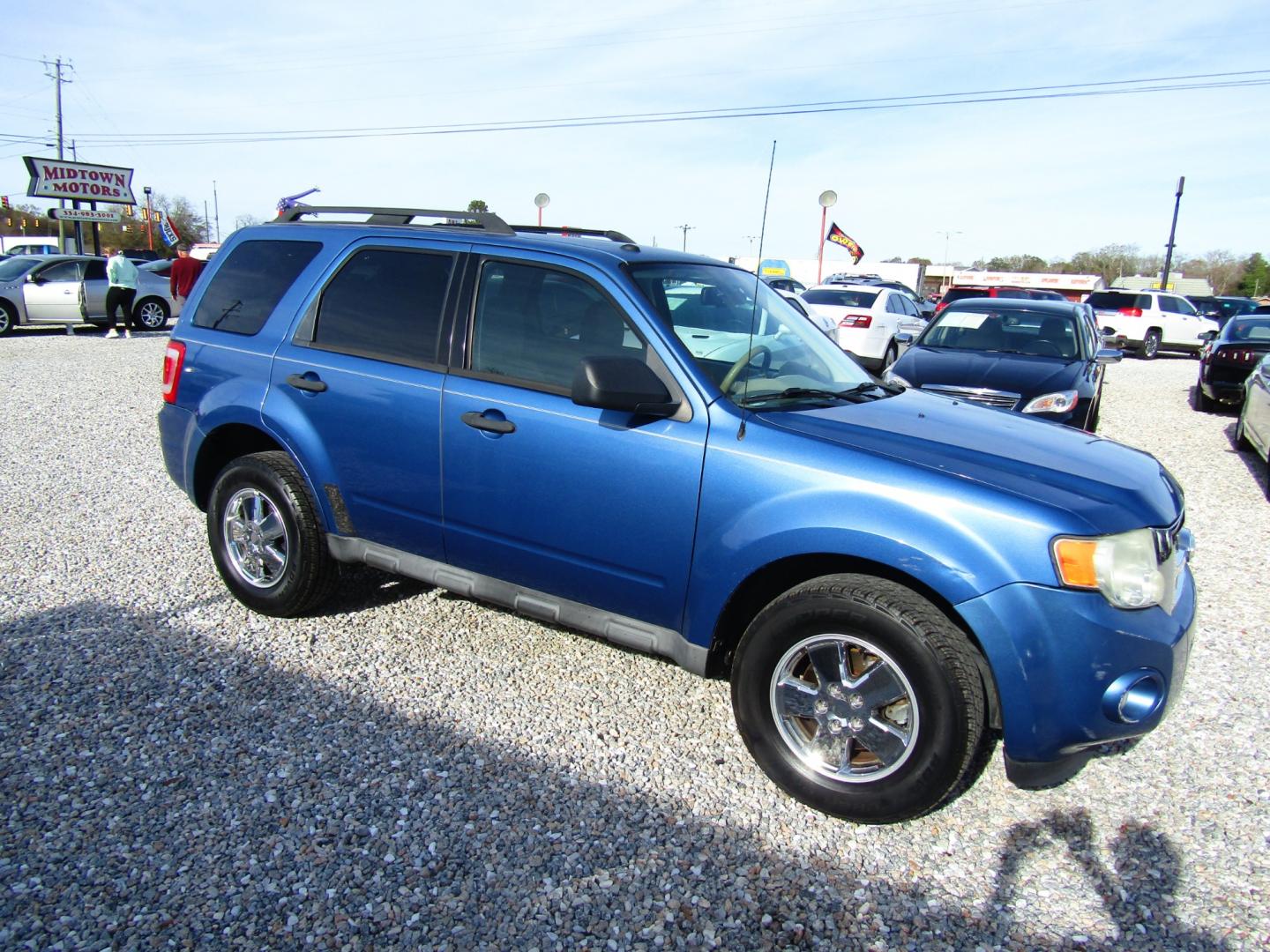 2010 Blue /Black Ford Escape XLT FWD (1FMCU0D72AK) with an 2.5L L4 DOHC 16V engine, Automatic transmission, located at 15016 S Hwy 231, Midland City, AL, 36350, (334) 983-3001, 31.306210, -85.495277 - Photo#0